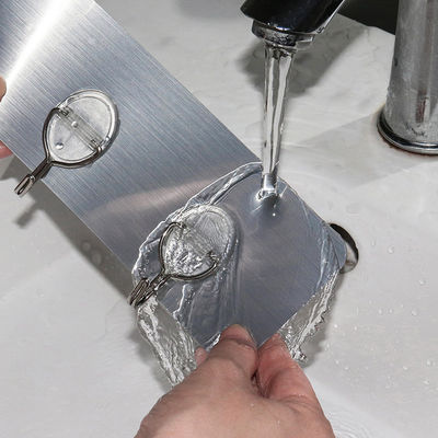 La parete del bagno di potere forte di tenuta aggancia lo stoccaggio autoadesivo