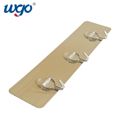 Piccoli ganci della parete del bagno di idea di stoccaggio degli oggetti per vita quotidiana